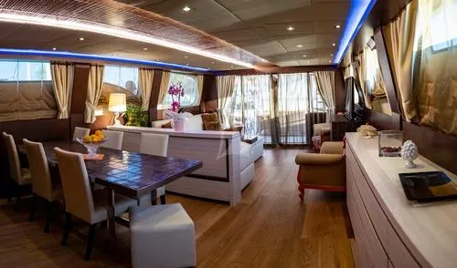  Yacht Photos Pics Luxurious interior of 2008 Tecnomar NADARA 80 flybridge yacht with elegant dining and seating area.