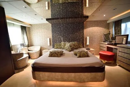  Yacht Photos Pics Luxurious bedroom interior of 2008 Tecnomar NADARA 80 flybridge yacht with elegant furnishings.
