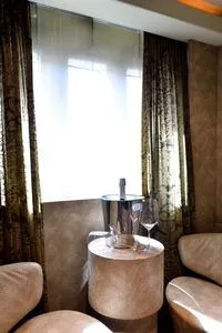  Yacht Photos Pics Luxurious interior of 2008 Tecnomar NADARA 80 flybridge with elegant seating and champagne setup.