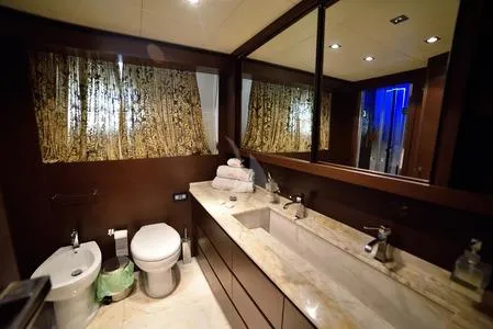  Yacht Photos Pics Luxurious bathroom in 2008 Tecnomar NADARA 80 flybridge yacht with marble countertop.