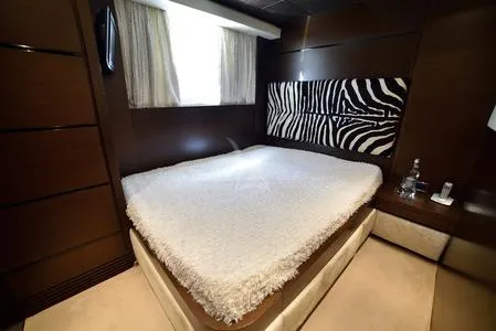  Yacht Photos Pics Luxurious bedroom interior on 2008 Tecnomar NADARA 80 flybridge yacht with zebra-patterned decor.
