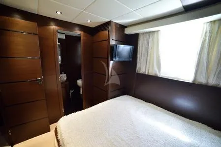  Yacht Photos Pics Luxurious bedroom interior of 2008 Tecnomar NADARA 80 flybridge yacht with modern amenities.