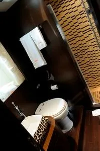  Yacht Photos Pics Luxurious bathroom on 2008 Tecnomar NADARA 80 flybridge yacht with modern fixtures and elegant design.