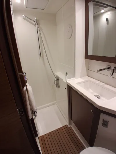 Paper Doll Yacht Photos Pics Modern bathroom in 2019 Lagoon 450 F yacht with shower and sink.