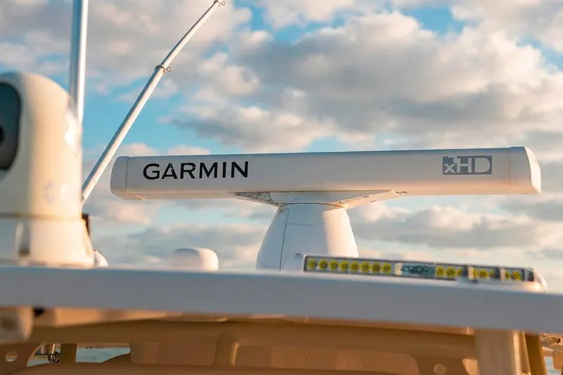  Yacht Photos Pics Garmin xHD radar on 2014 Grady-White Canyon 336 boat under cloudy sky.
