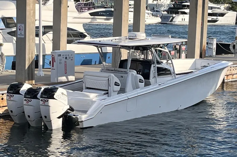  Yacht Photos Pics 2019 Nor-Tech 390 Sport Center Console boat docked with triple 400R engines.