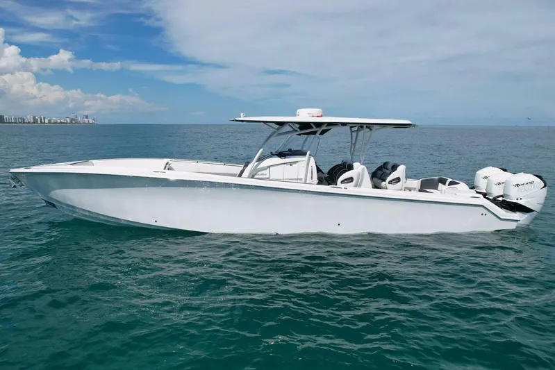  Yacht Photos Pics 2019 Nor-Tech 390 Sport Center Console boat on open water under blue sky.