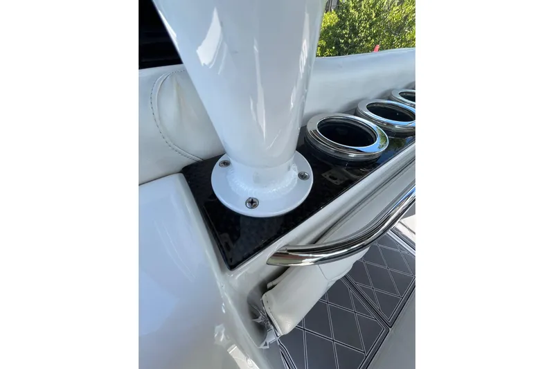  Yacht Photos Pics 2019 Nor-Tech 390 Sport Center Console boat detail with cup holders and sleek design.