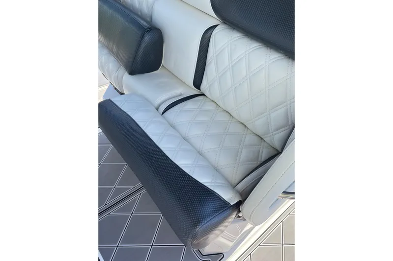  Yacht Photos Pics Luxurious seating on 2019 Nor-Tech 390 Sport Center Console with diamond-pattern upholstery.