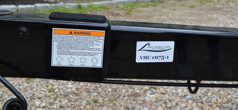  Yacht Photos Pics Trailer hitch with warning label for 2023 Nautique Super Air Nautique S23 boat.