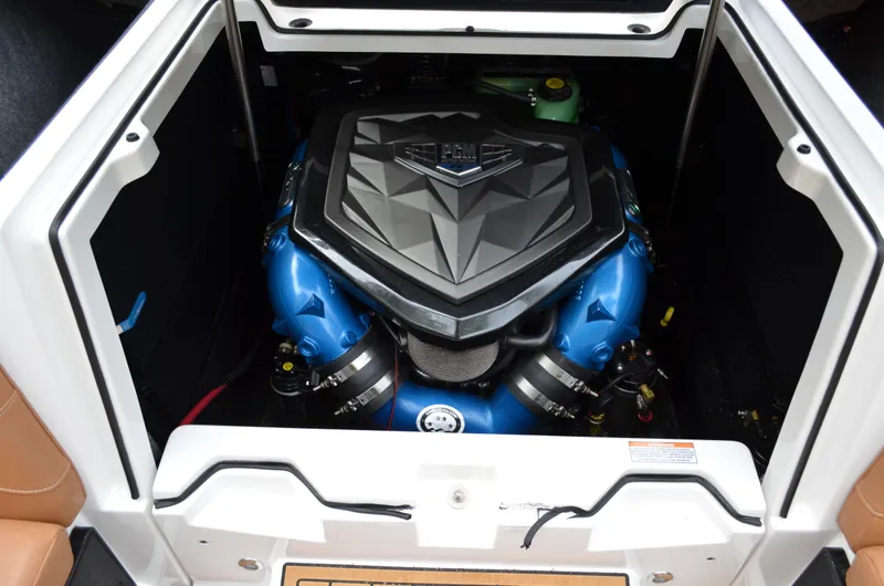  Yacht Photos Pics 2023 Nautique Super Air Nautique S23 engine compartment with a powerful, modern engine design.