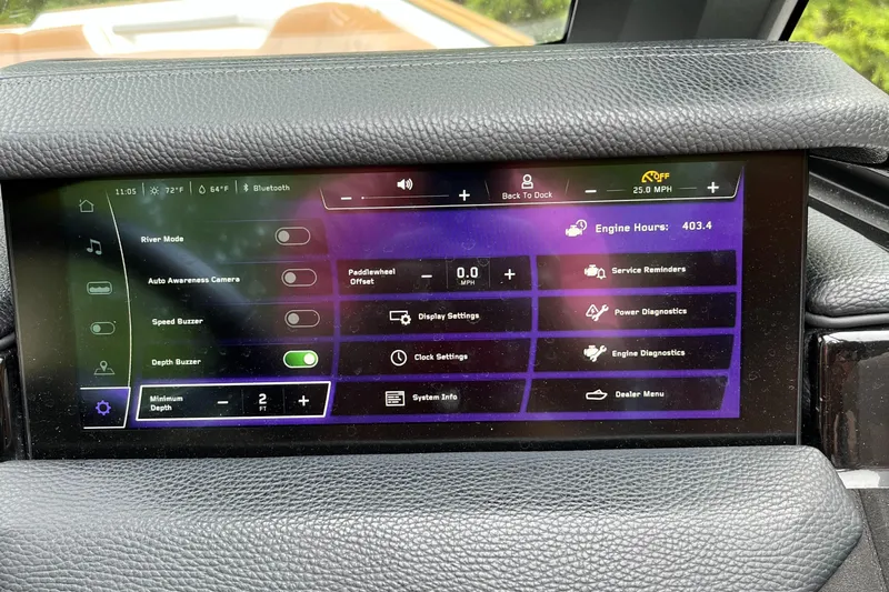  Yacht Photos Pics Touchscreen display of a 2023 Nautique Super Air Nautique S23 boat showing various control settings.
