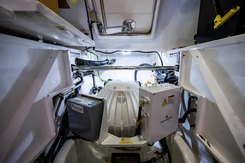 Pivot Yacht Photos Pics Engine room of a 2013 Marlow Explorer Enclosed Bridge (CB) yacht.