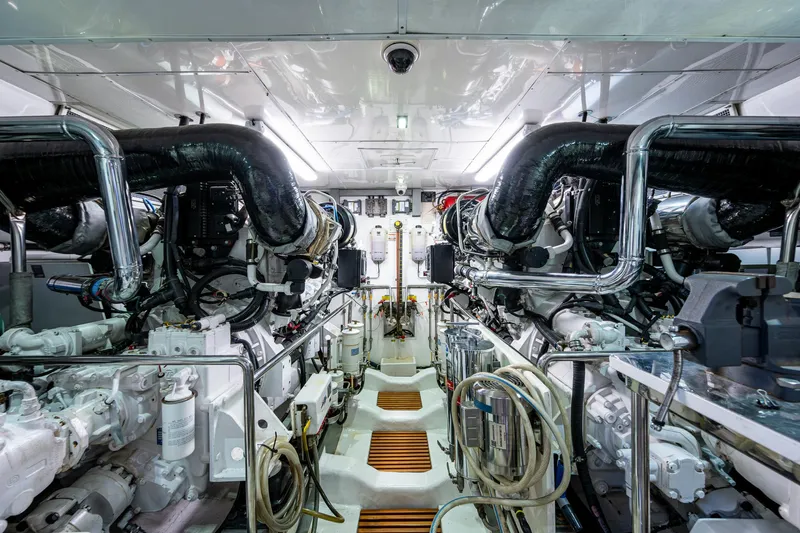 Pivot Yacht Photos Pics Engine room of a 2013 Marlow Explorer Enclosed Bridge (CB) yacht.