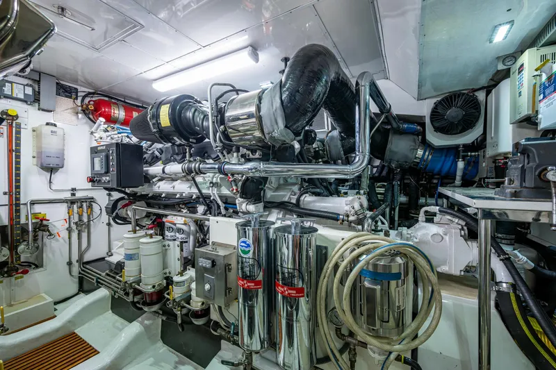 Pivot Yacht Photos Pics Engine room of a 2013 Marlow Explorer Enclosed Bridge (CB) yacht.