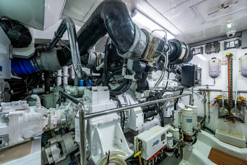 Pivot Yacht Photos Pics Engine room of a 2013 Marlow Explorer Enclosed Bridge (CB) yacht.