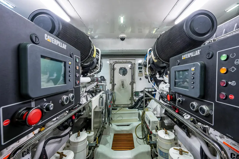 Pivot Yacht Photos Pics Engine room of a 2013 Marlow Explorer Enclosed Bridge (CB) yacht with Caterpillar engines.