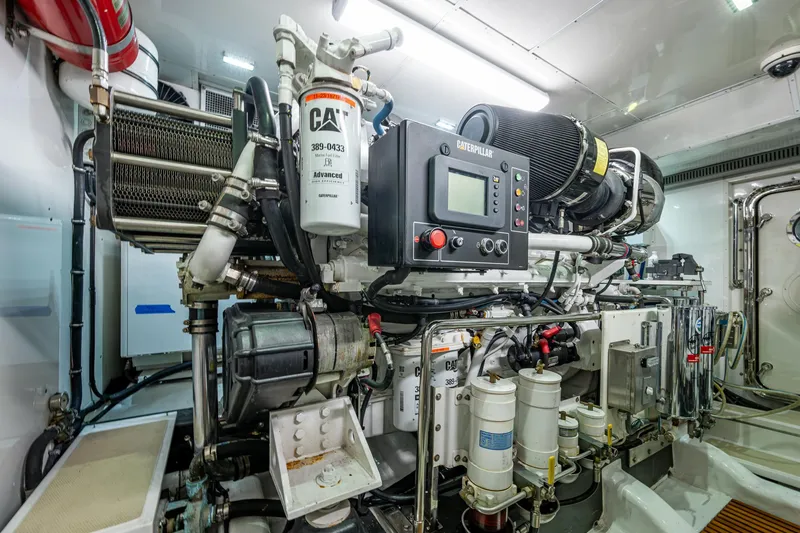 Pivot Yacht Photos Pics Engine room of a 2013 Marlow Explorer Enclosed Bridge (CB) yacht.