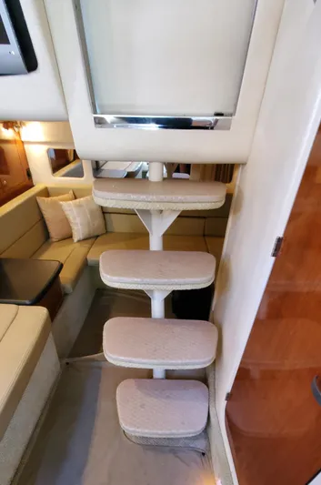 Just Becuz Yacht Photos Pics Interior stairs of 2007 Sea Ray 310 Sundancer yacht, featuring plush steps and modern design.