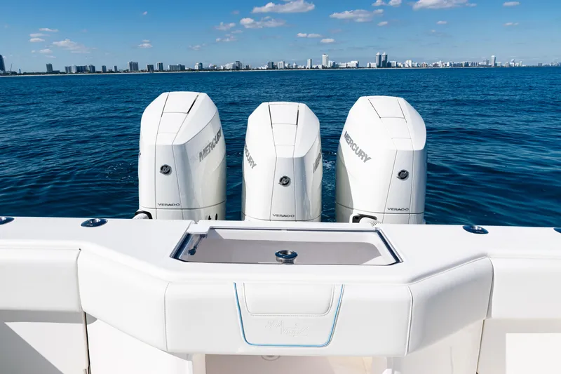  Yacht Photos Pics 2024 SeaVee 390B boat with triple Mercury Verado engines on open water.