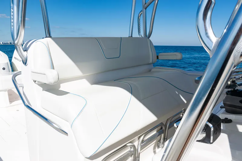  Yacht Photos Pics 2024 SeaVee 390B boat with white seating and ocean backdrop.