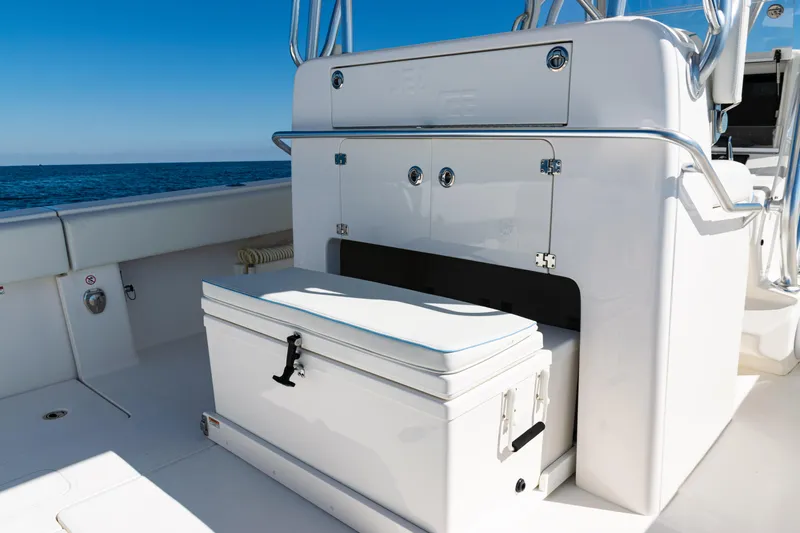  Yacht Photos Pics 2024 SeaVee 390B boat interior with storage and seating, ocean view.