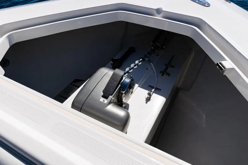  Yacht Photos Pics Anchor compartment of 2024 SeaVee 390B boat, featuring a secure chain and winch system.