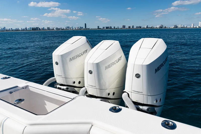  Yacht Photos Pics 2024 SeaVee 390B boat with triple Mercury Verado engines on open water.