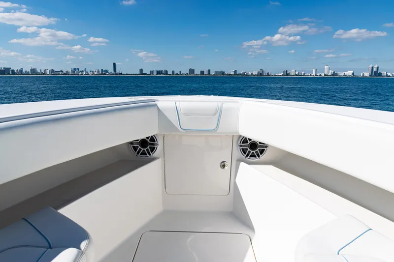  Yacht Photos Pics 2024 SeaVee 390B boat interior with ocean and city skyline view.