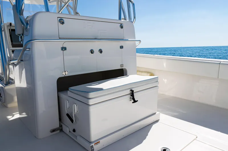  Yacht Photos Pics 2024 SeaVee 390B boat interior with storage compartment and ocean view.