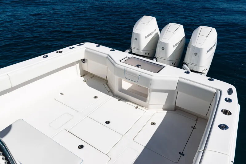  Yacht Photos Pics 2024 SeaVee 390B boat with triple Mercury outboard engines on open water.