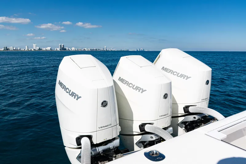  Yacht Photos Pics 2024 SeaVee 390B boat with triple Mercury Verado engines on open ocean.