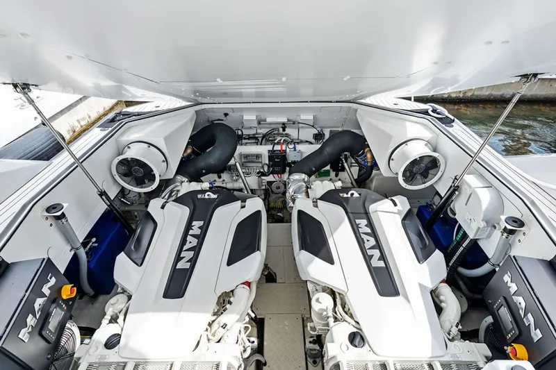 Mana Yacht Photos Pics Engine compartment of 2025 Maori m54 yacht with dual MAN engines, showcasing advanced marine engineering.