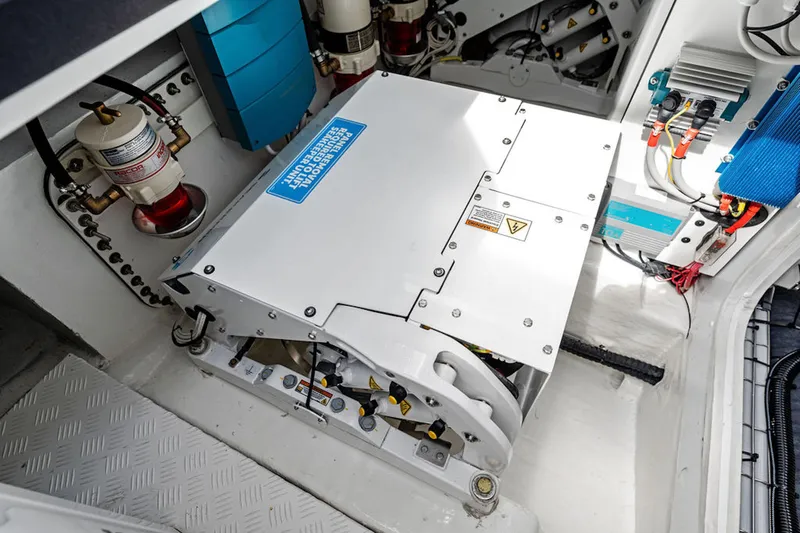 Mana Yacht Photos Pics Engine compartment of a 2025 Maori m54, showcasing advanced mechanical components and wiring.
