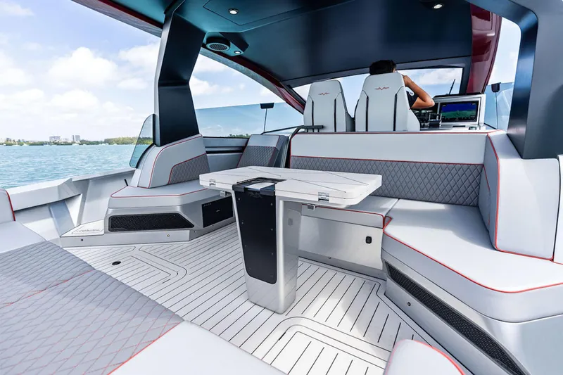 Mana Yacht Photos Pics Luxurious interior of 2025 Maori m54 yacht with modern seating and sleek design.
