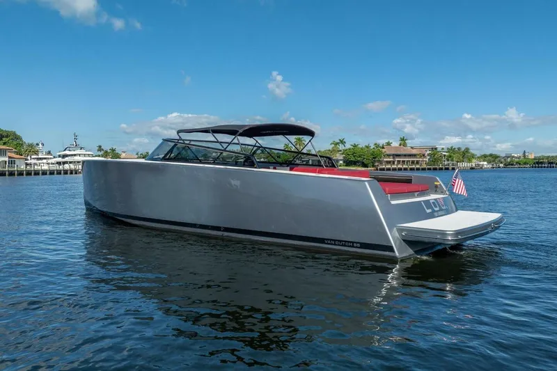 L.o.u. Yacht Photos Pics 2016 VanDutch 55 yacht on calm water, sleek design, sunny day.