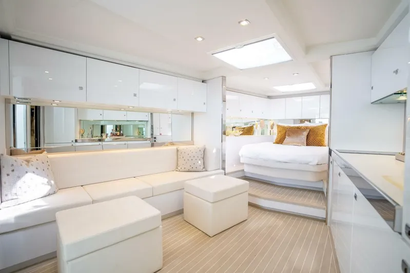 L.o.u. Yacht Photos Pics Luxurious interior of 2016 VanDutch 55 yacht with modern white furnishings and elegant design.
