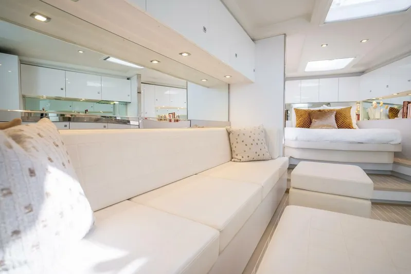 L.o.u. Yacht Photos Pics Luxurious interior of 2016 VanDutch 55 yacht with elegant white seating and modern design.