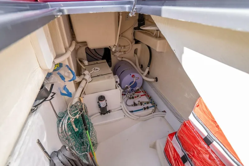 L.o.u. Yacht Photos Pics Engine room of 2016 VanDutch 55 yacht, showcasing mechanical components and storage.