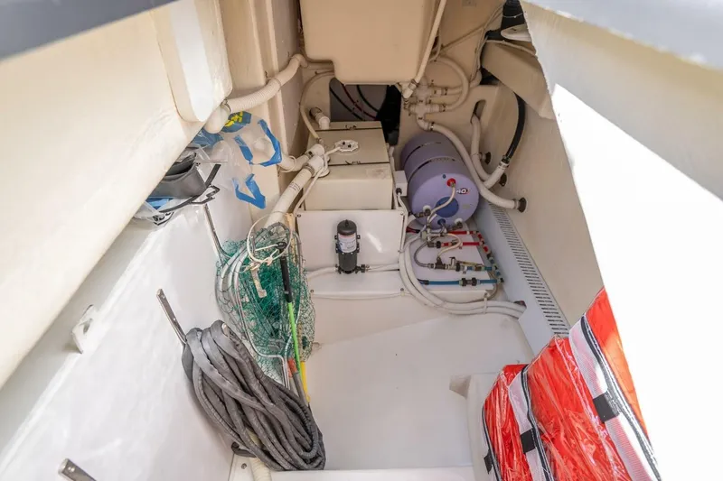 L.o.u. Yacht Photos Pics Engine room of 2016 VanDutch 55 yacht, featuring equipment and storage.