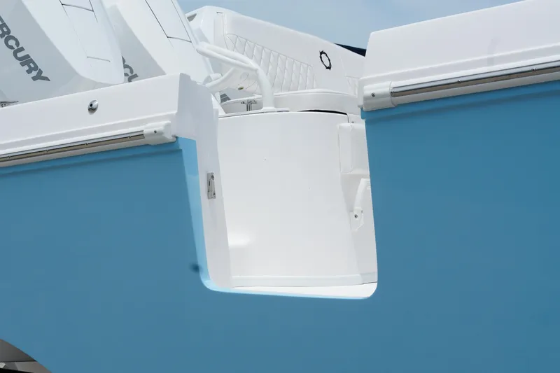  Yacht Photos Pics 2025 Fountain 38 CC boat with blue and white exterior, featuring Mercury engines.