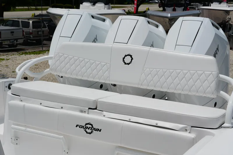 Yacht Photos Pics 2025 Fountain 38 CC boat with triple Mercury engines and diamond-stitched seating.