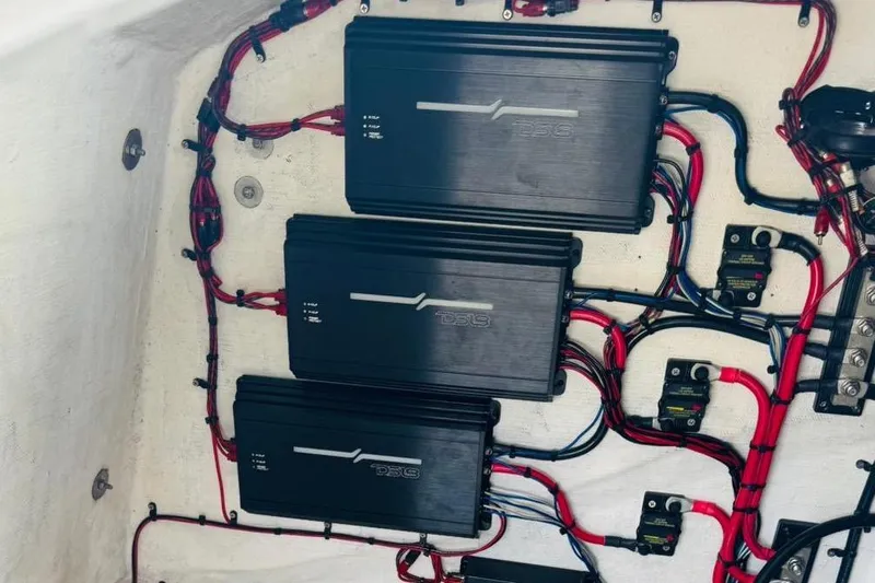  Yacht Photos Pics Electrical system of a 2005 Carrera Boats 32, featuring neatly arranged wiring and components.