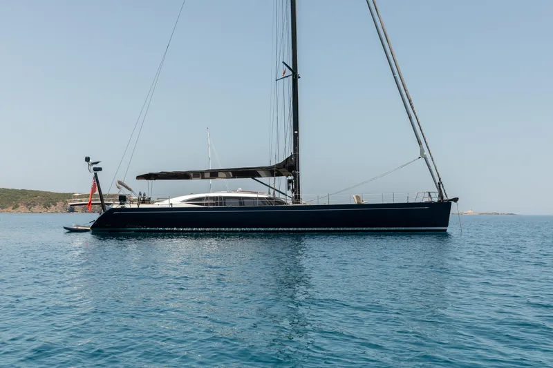 Caiarossa Yacht Photos Pics Luxurious 2009 Shipman 72 yacht sailing on calm blue waters.