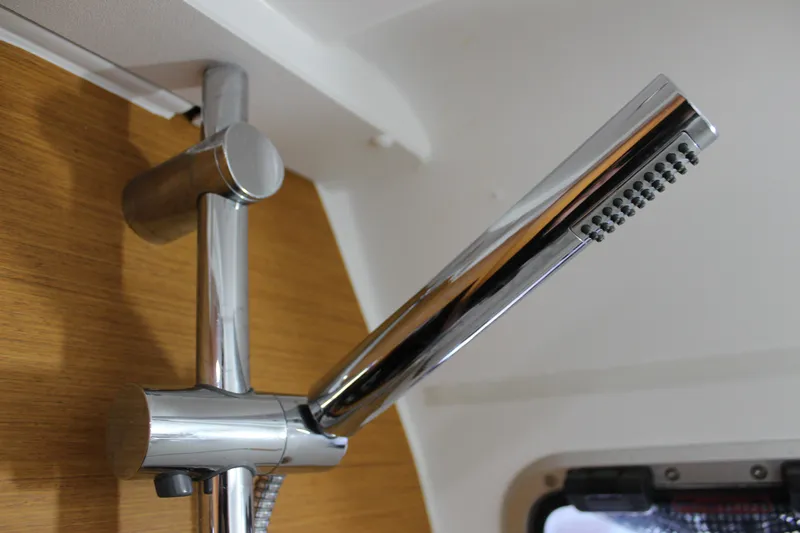 Selkie Yacht Photos Pics Chrome shower fixture in 2015 Jeanneau Sun Odyssey 349 yacht bathroom.
