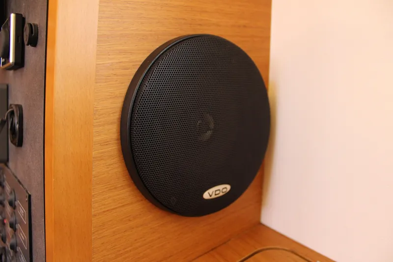 Selkie Yacht Photos Pics Speaker system on Jeanneau Sun Odyssey 349 yacht, 2015 model, with wooden paneling.