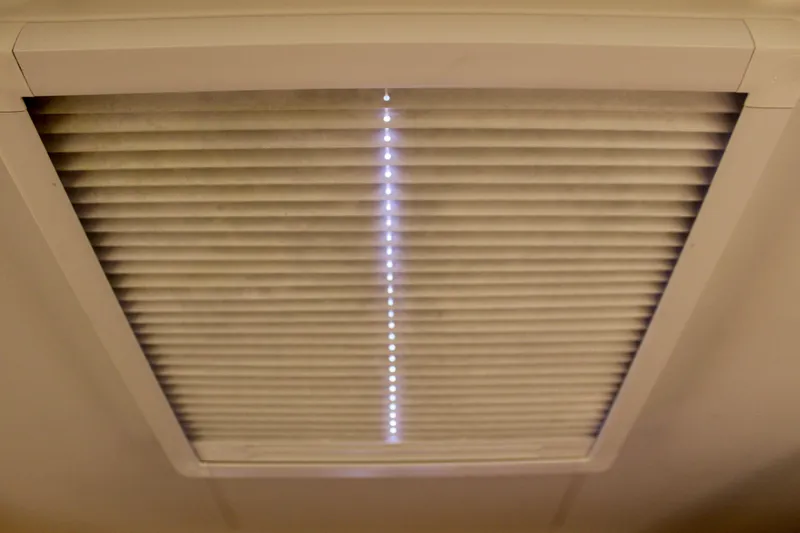 Selkie Yacht Photos Pics Ceiling vent with closed blinds on a 2015 Jeanneau Sun Odyssey 349 yacht.