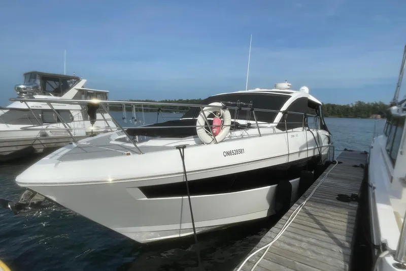  Yacht Photos Pics 2019 Cruisers Yachts 390 Express Coupe docked at marina, side view.