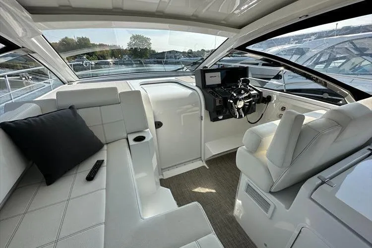  Yacht Photos Pics 2019 Cruisers Yachts 390 Express Coupe cockpit with modern helm and seating.