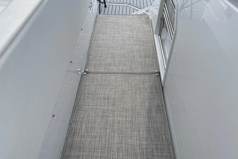  Yacht Photos Pics 2019 Cruisers Yachts 390 Express Coupe deck with textured flooring.